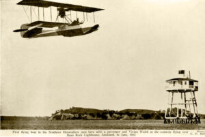 First flying boat in the Southern Hemisphere with Vivian Walsh at the controls flying over Bean Rock Lighthouse, Auckland, in June 1915.